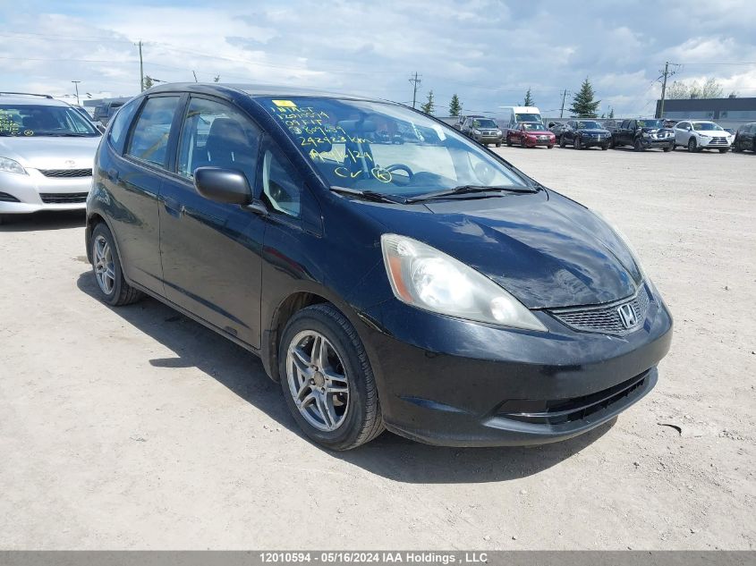 2009 Honda Fit VIN: JHMGE87349S809659 Lot: 12010594