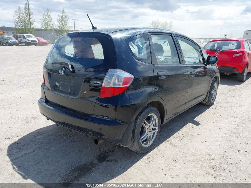 2009 Honda Fit VIN: JHMGE87349S809659 Lot: 12010594