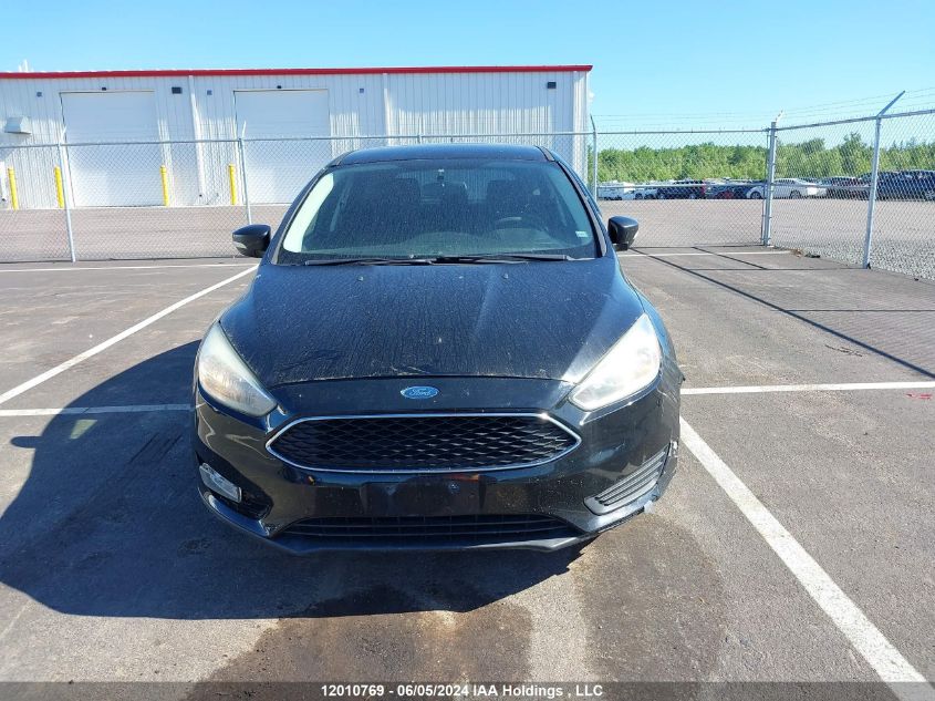 2015 Ford Focus Se VIN: 1FADP3K24FL303034 Lot: 12010769