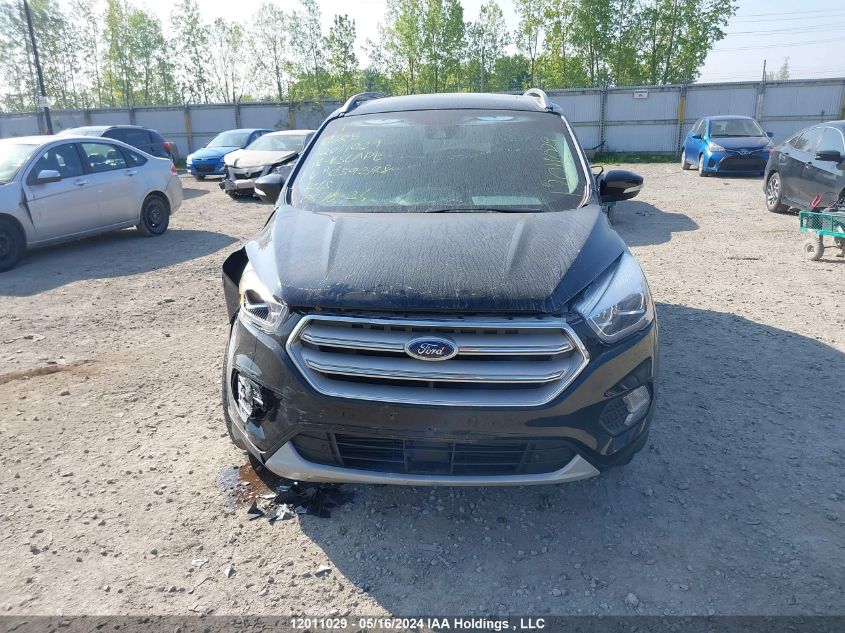 2018 Ford Escape Titanium VIN: 1FMCU9J94JUC39298 Lot: 12011029