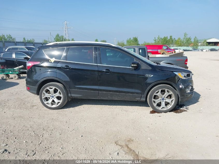 2018 Ford Escape Titanium VIN: 1FMCU9J94JUC39298 Lot: 12011029