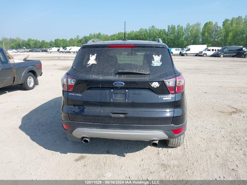 2018 Ford Escape Titanium VIN: 1FMCU9J94JUC39298 Lot: 12011029