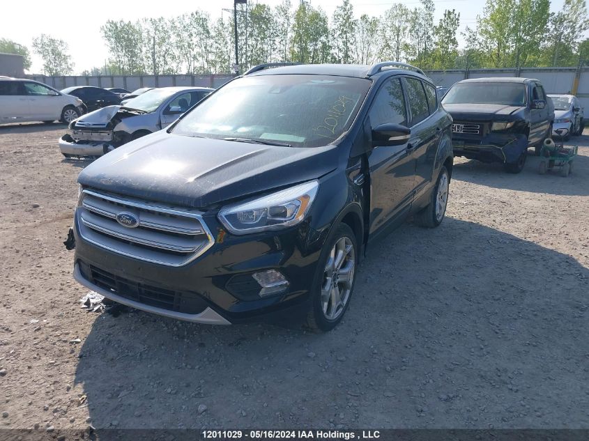 2018 Ford Escape Titanium VIN: 1FMCU9J94JUC39298 Lot: 12011029