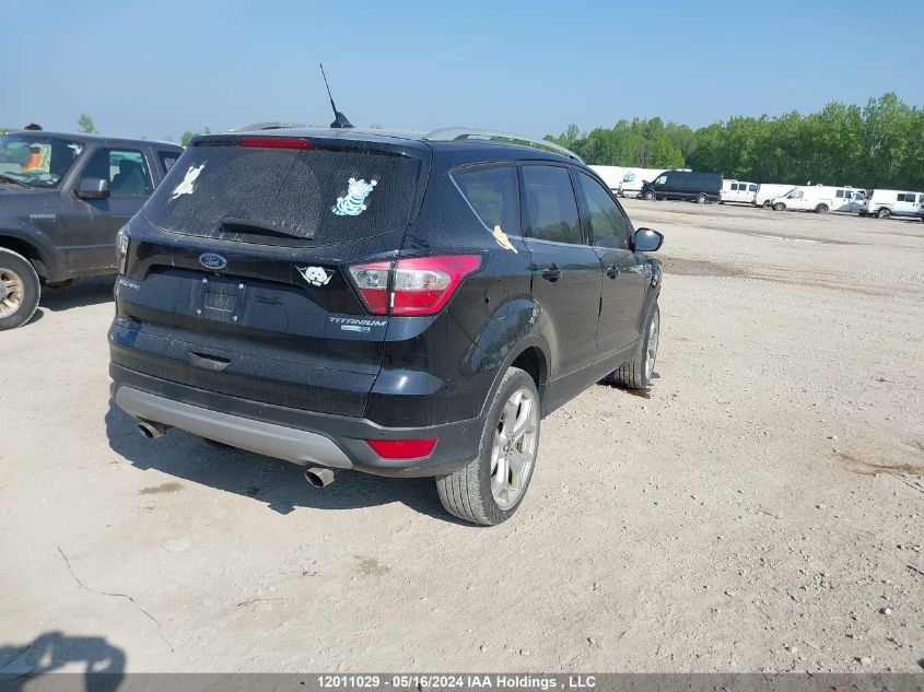 2018 Ford Escape Titanium VIN: 1FMCU9J94JUC39298 Lot: 12011029