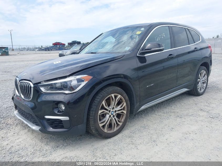 2018 BMW X1 VIN: WBXHT3C35J5K22705 Lot: 12011218