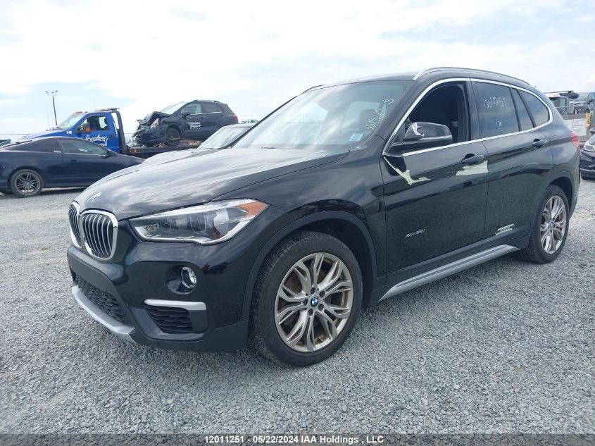 2018 BMW X1 VIN: WBXHT3C3XJ5F92096 Lot: 12011251