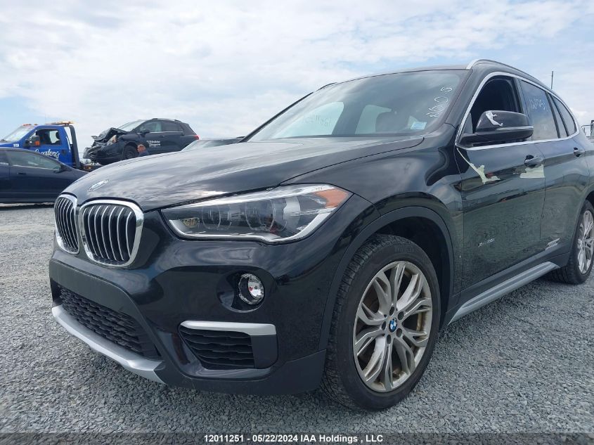 2018 BMW X1 VIN: WBXHT3C3XJ5F92096 Lot: 12011251