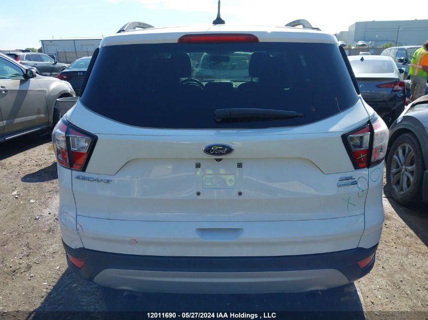 2018 Ford Escape Sel VIN: 1FMCU9H91JUC96340 Lot: 12011690