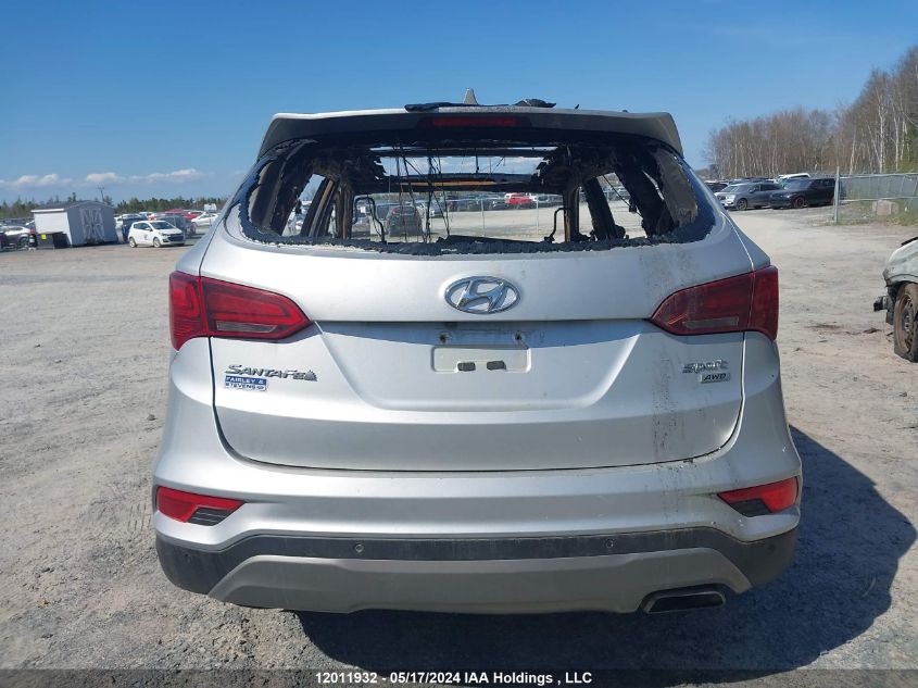 2018 Hyundai Santa Fe Sport 2.4 Se VIN: 5XYZUDLB1JG517867 Lot: 12011932