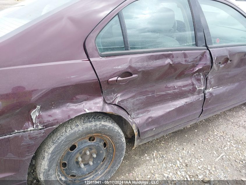 2011 Ford Fusion S VIN: 3FAHP0GA2BR157647 Lot: 12011941