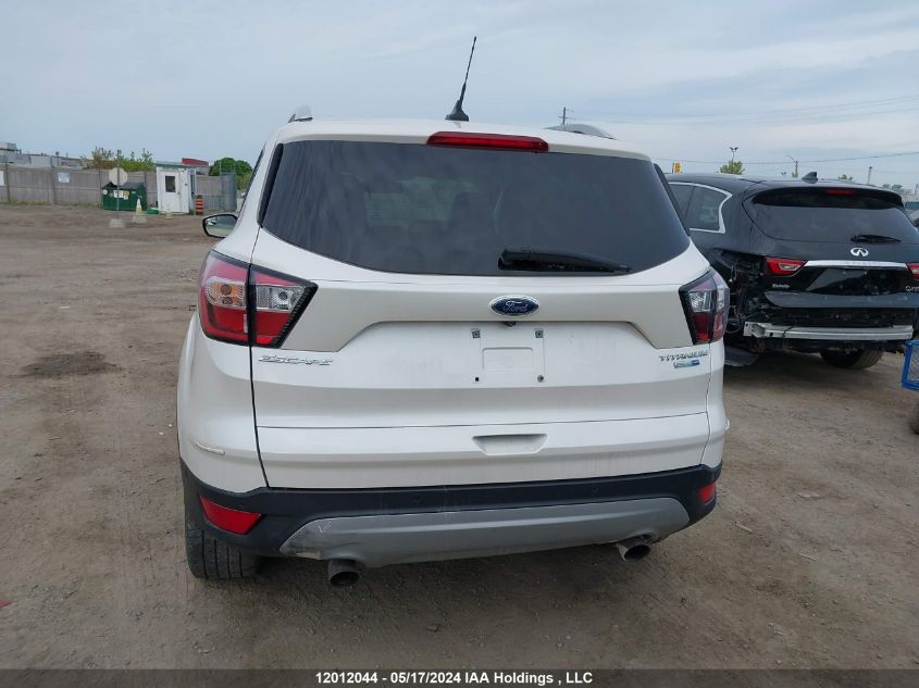 2018 Ford Escape Titanium VIN: 1FMCU9J92JUB88643 Lot: 12012044
