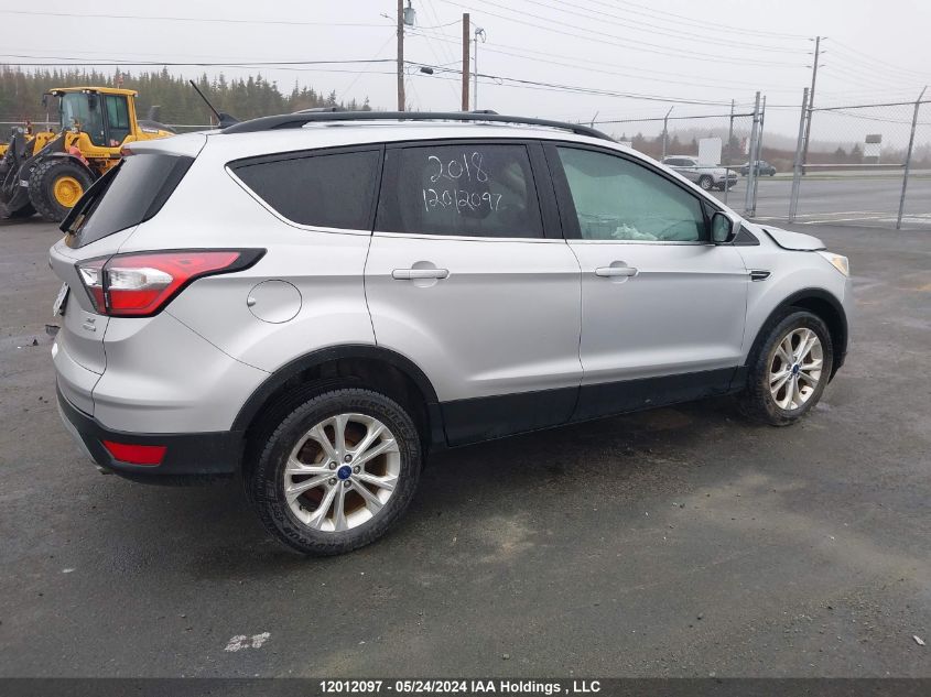 2018 Ford Escape Se VIN: 1FMCU0GDXJUA13046 Lot: 12012097