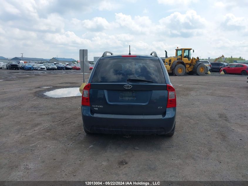 2009 Kia Rondo VIN: KNAFG528X97286592 Lot: 12013004