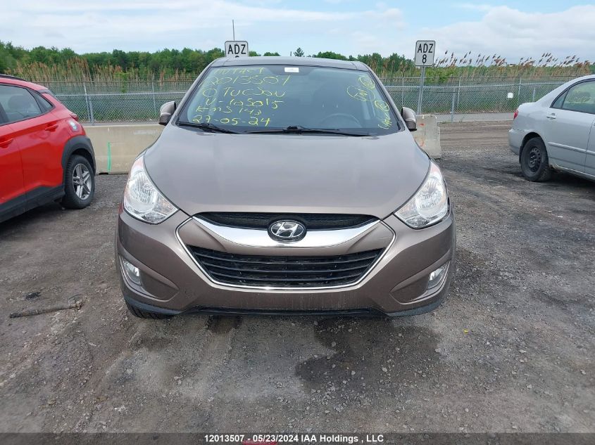 2010 Hyundai Tucson VIN: KM8JUCAC9AU105015 Lot: 12013507