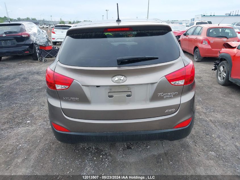 2010 Hyundai Tucson VIN: KM8JUCAC9AU105015 Lot: 12013507