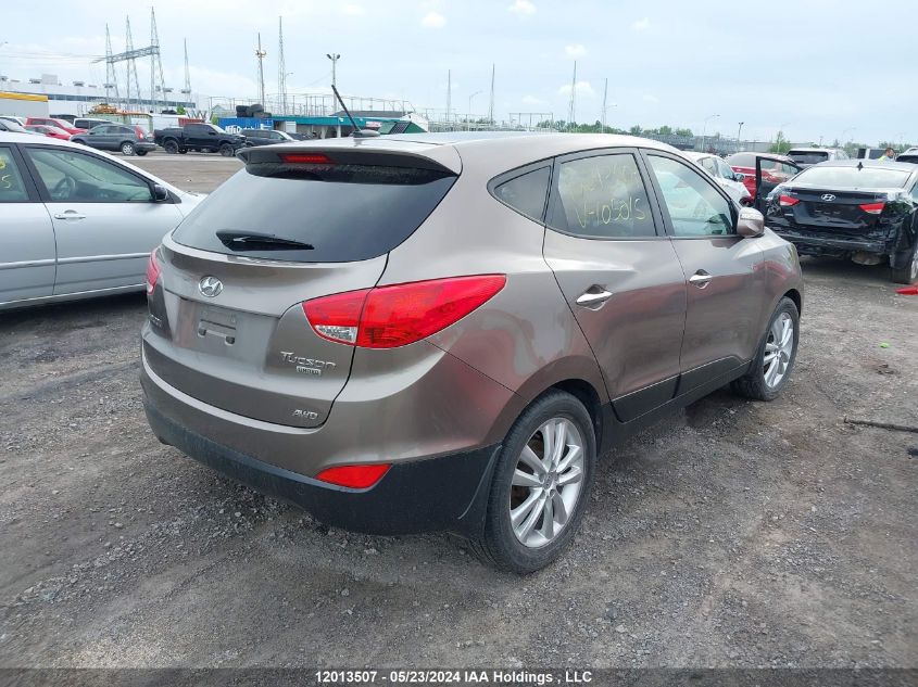 2010 Hyundai Tucson VIN: KM8JUCAC9AU105015 Lot: 12013507