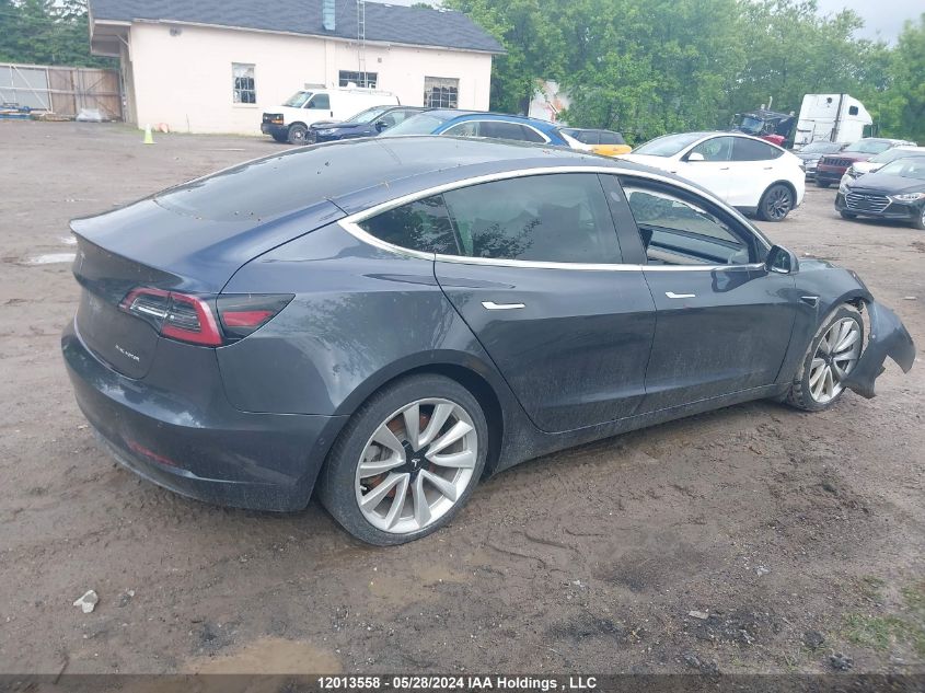 2018 Tesla Model 3 Long Range/Performance VIN: 5YJ3E1EB1JF107401 Lot: 12013558