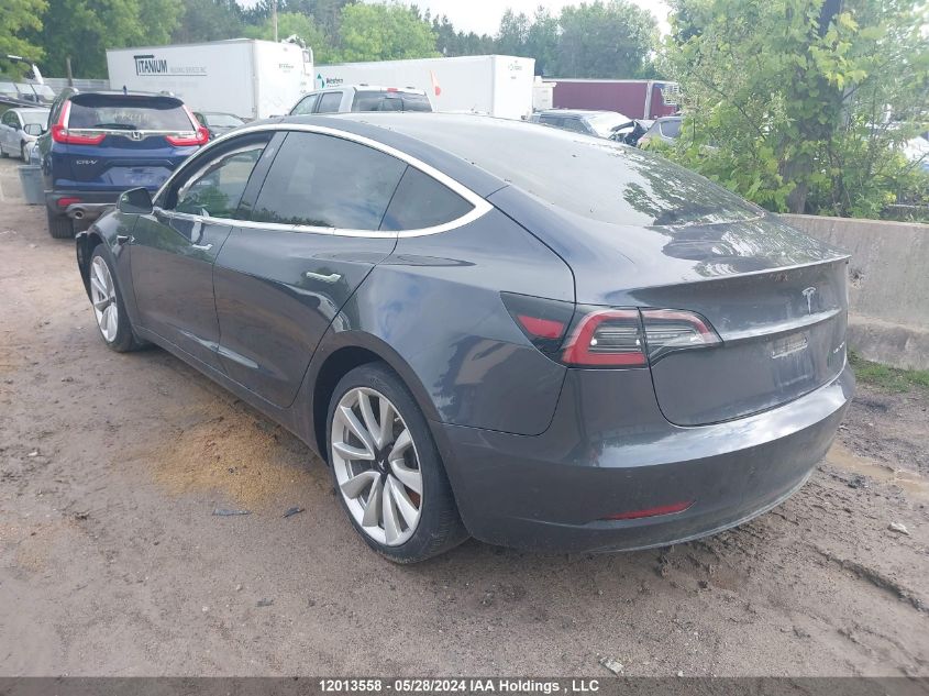 2018 Tesla Model 3 Long Range/Performance VIN: 5YJ3E1EB1JF107401 Lot: 12013558