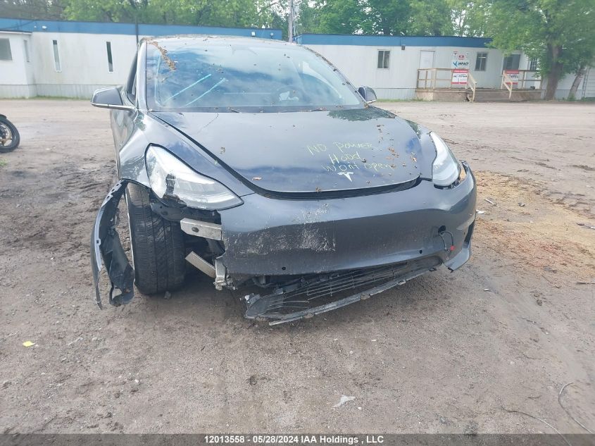 2018 Tesla Model 3 Long Range/Performance VIN: 5YJ3E1EB1JF107401 Lot: 12013558