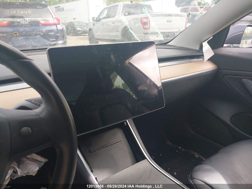 2018 Tesla Model 3 Long Range/Performance VIN: 5YJ3E1EB1JF107401 Lot: 12013558