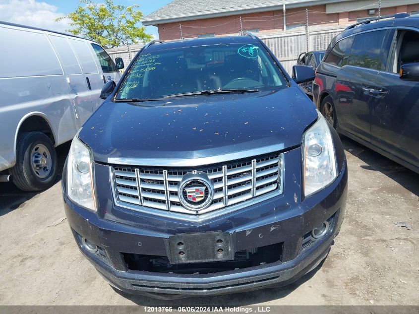 2015 Cadillac Srx VIN: 3GYFNGE39FS621143 Lot: 12013765