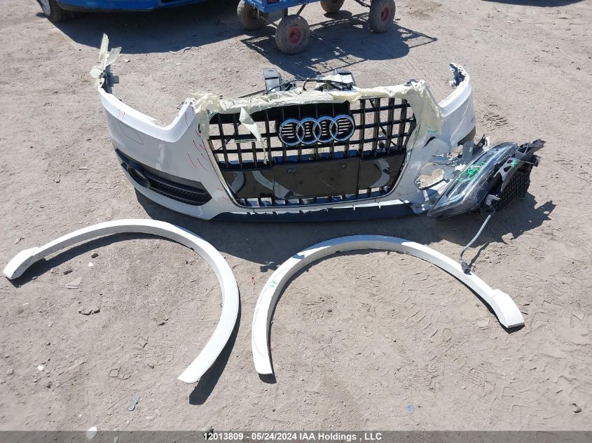 2015 Audi Q3 VIN: WA1GFEFSXFR010679 Lot: 12013809