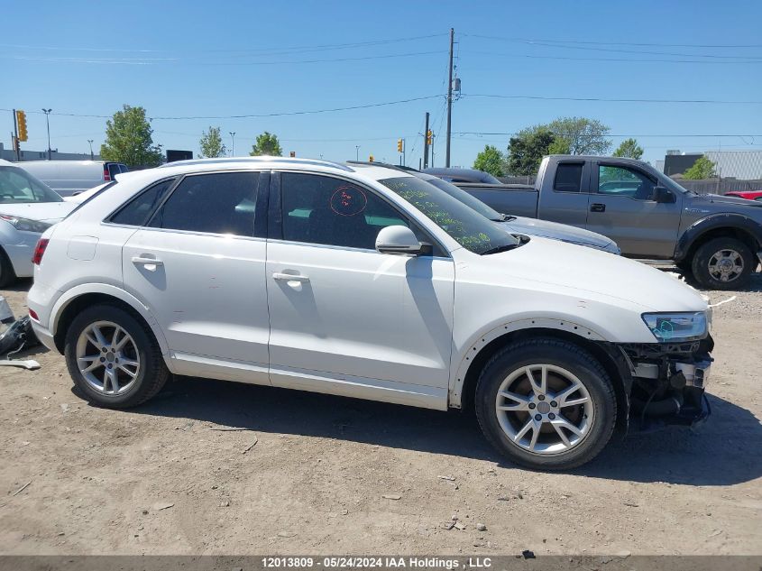 2015 Audi Q3 VIN: WA1GFEFSXFR010679 Lot: 12013809