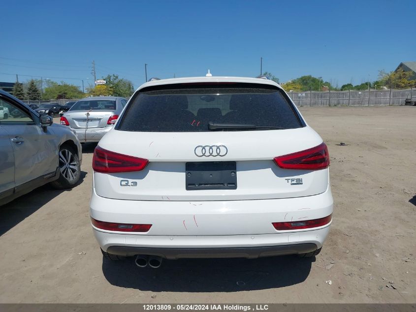 2015 Audi Q3 VIN: WA1GFEFSXFR010679 Lot: 12013809