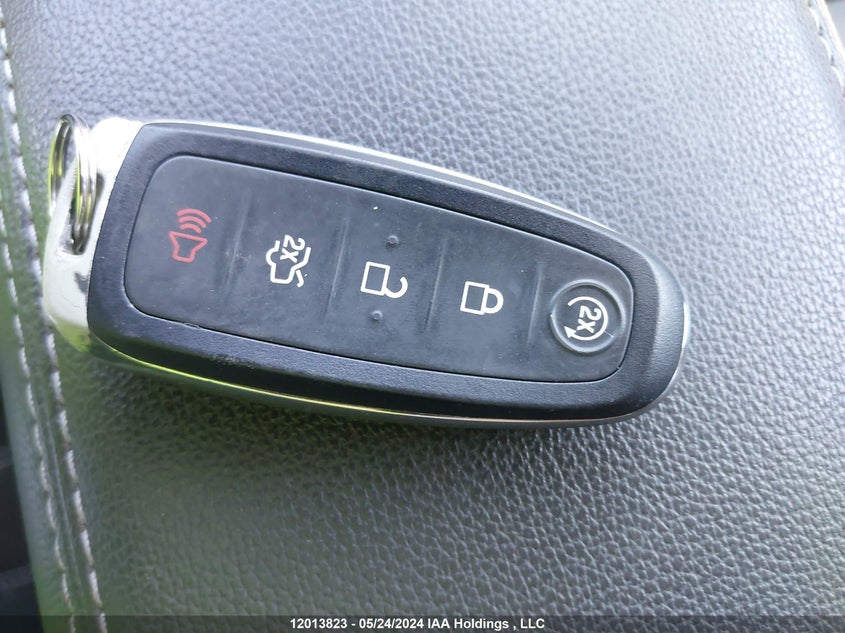 2017 Ford Escape Titanium VIN: 1FMCU9J94HUE99856 Lot: 12013823