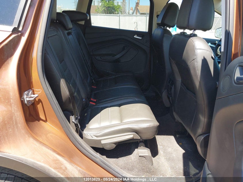 2017 Ford Escape Titanium VIN: 1FMCU9J94HUE99856 Lot: 12013823