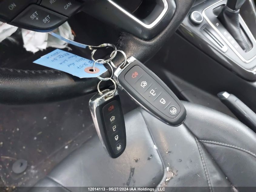 2016 Ford Focus Titanium VIN: 1FADP3N23GL334482 Lot: 12014113