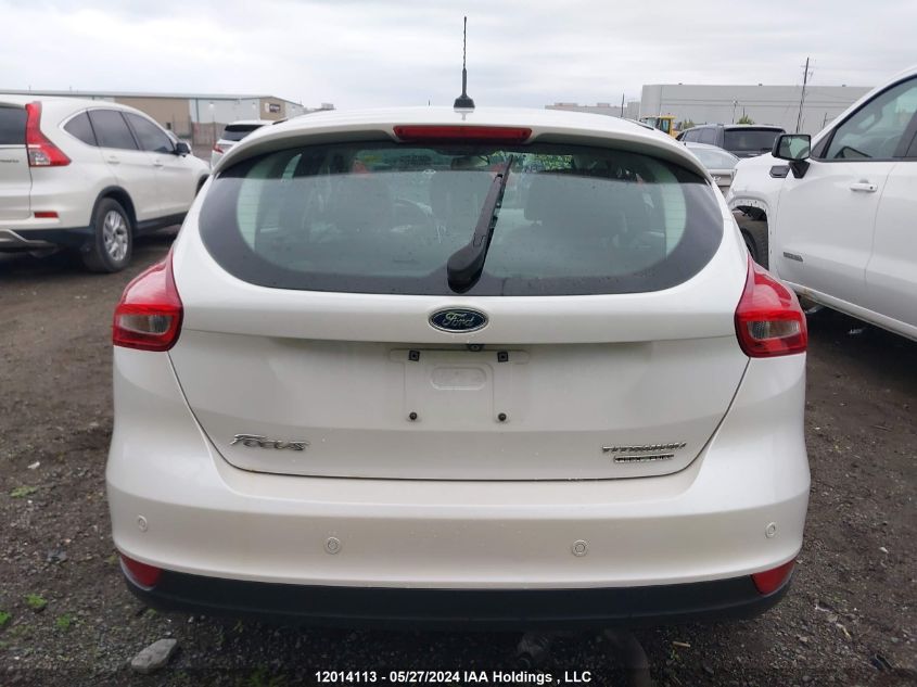 2016 Ford Focus Titanium VIN: 1FADP3N23GL334482 Lot: 12014113