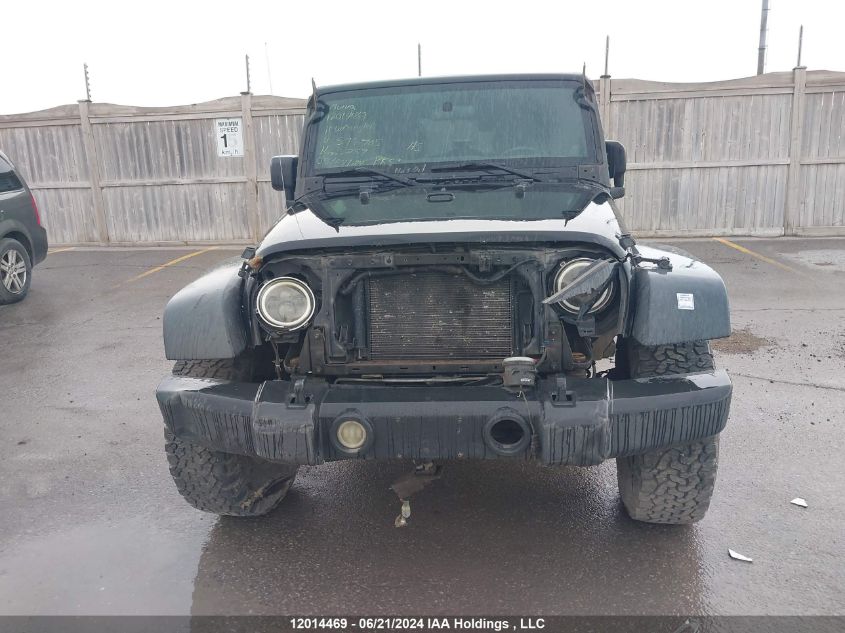 2011 Jeep Wrangler Unlimited VIN: 1J4HA6H1XBL579705 Lot: 12014469