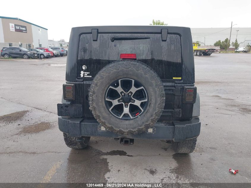 2011 Jeep Wrangler Unlimited VIN: 1J4HA6H1XBL579705 Lot: 12014469