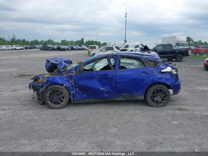 2015 Ford Focus Se VIN: 1FADP3K24FL308671 Lot: 12014582