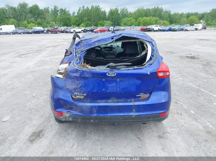 2015 Ford Focus Se VIN: 1FADP3K24FL308671 Lot: 12014582