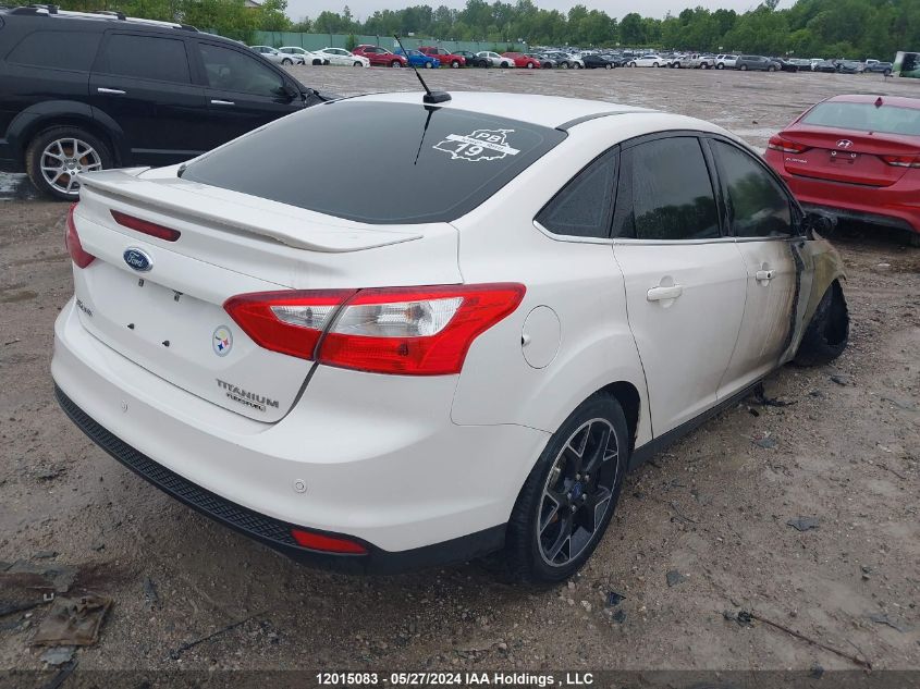 2012 Ford Focus Titanium VIN: 1FAHP3J2XCL397810 Lot: 12015083