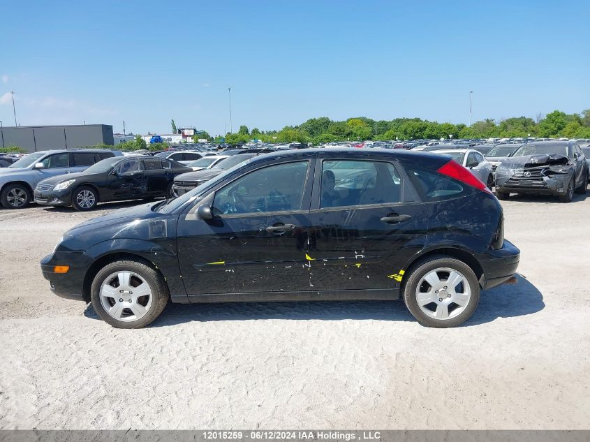 2005 Ford Focus VIN: 3FAFP37N05R144931 Lot: 12015259