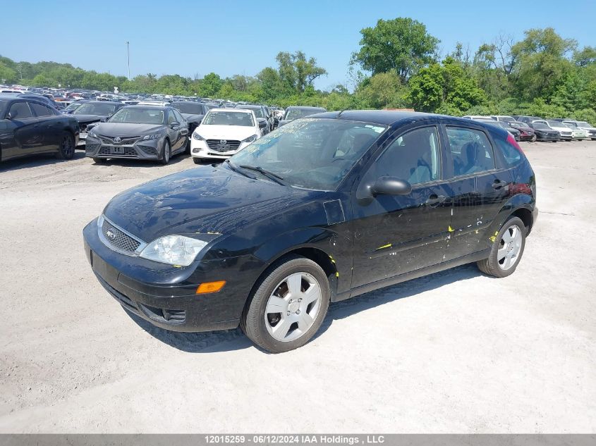 2005 Ford Focus VIN: 3FAFP37N05R144931 Lot: 12015259