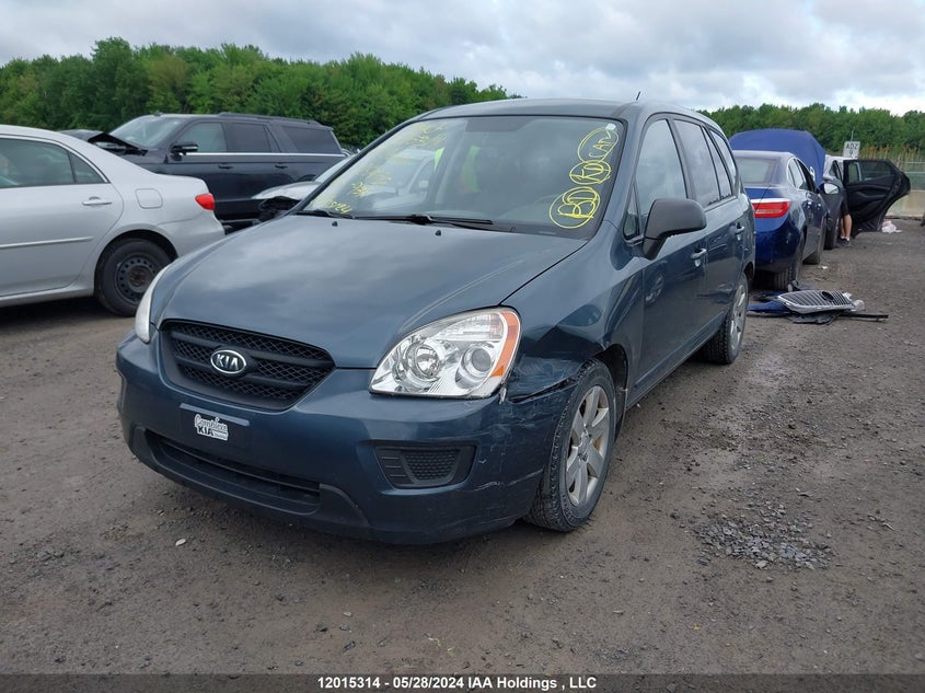 2009 Kia Rondo VIN: KNAFG528697254156 Lot: 12015314