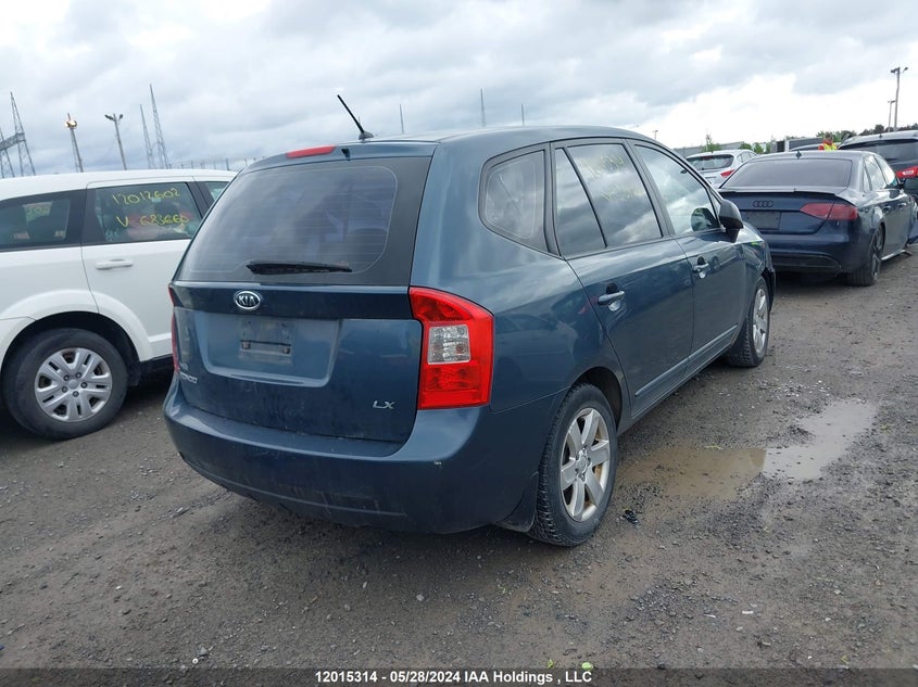 2009 Kia Rondo VIN: KNAFG528697254156 Lot: 12015314