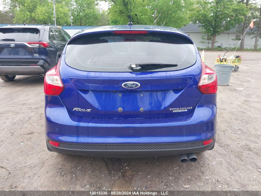 2013 Ford Focus Titanium VIN: 1FADP3N25DL310695 Lot: 12015335