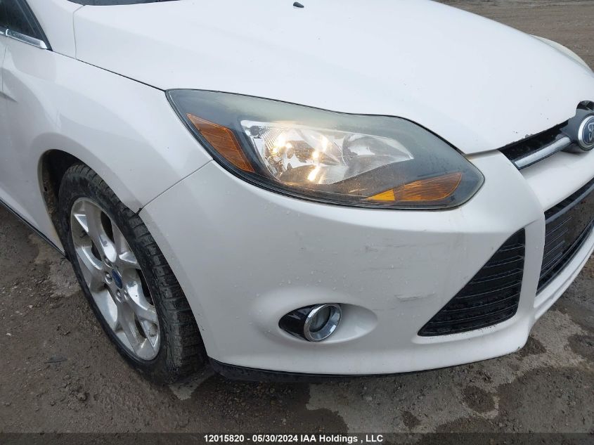 2013 Ford Focus Titanium VIN: 1FADP3J27DL119656 Lot: 12015820