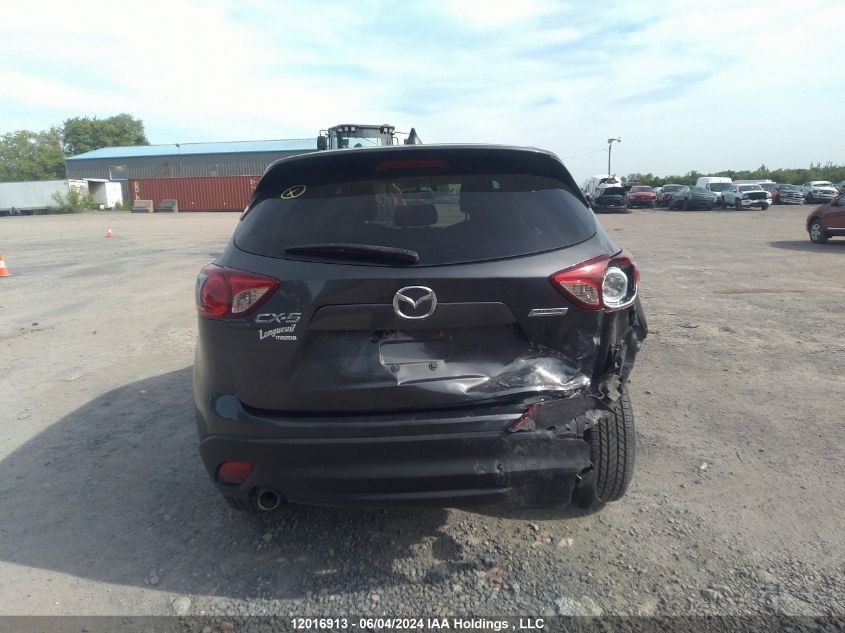 2014 Mazda Cx-5 Touring VIN: JM3KE2CY4E0394253 Lot: 12016913