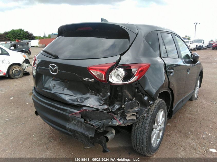 2014 Mazda Cx-5 Touring VIN: JM3KE2CY4E0394253 Lot: 12016913