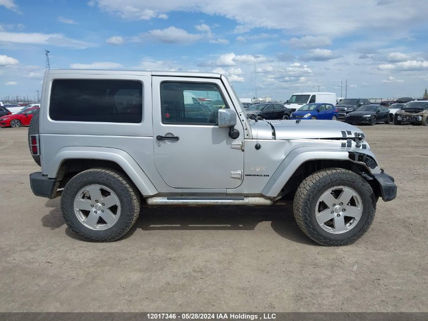 2011 Jeep Wrangler Sahara VIN: 1J4AA5D1XBL595291 Lot: 12017346