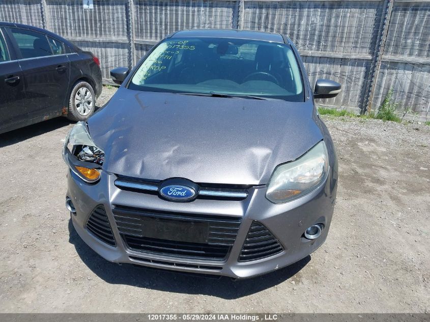 2012 Ford Focus Titanium VIN: 1FAHP3N22CL164711 Lot: 12017355