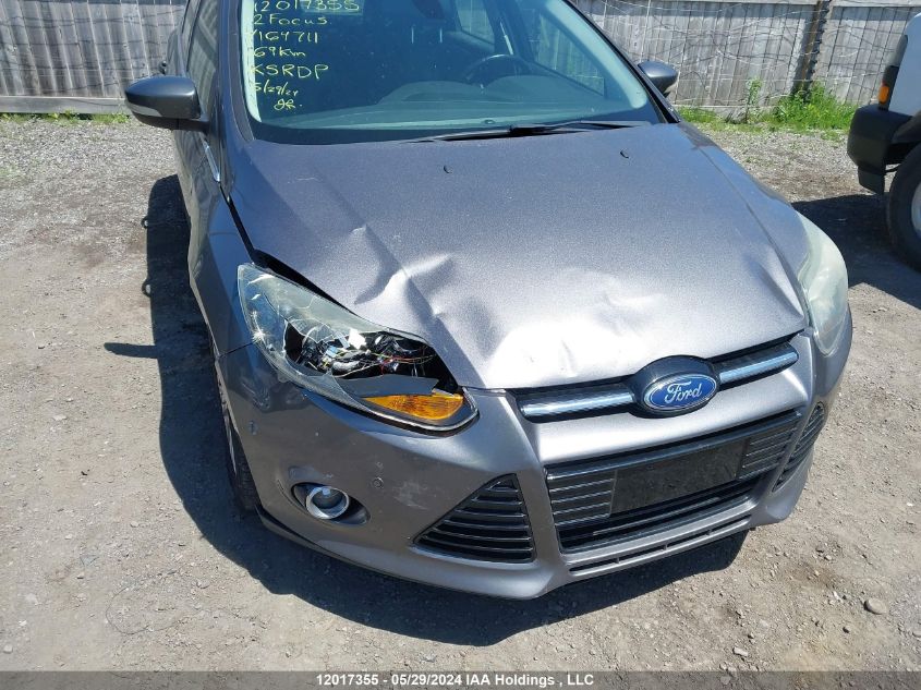 2012 Ford Focus Titanium VIN: 1FAHP3N22CL164711 Lot: 12017355
