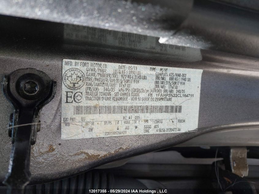 2012 Ford Focus Titanium VIN: 1FAHP3N22CL164711 Lot: 12017355