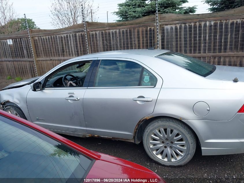 2012 Ford Fusion Hybrid VIN: 3FADP0L38CR264029 Lot: 12017896